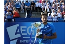 EASTBOURNE, ENGLAND - JUNE 21:  Feliciano Lopez of Spain celebrates with the trophy after beating Richard Gasquet of France during their Men's Singles Finals match on day eight of the Aegon International at Devonshire Park on June 21, 2014 in Eastbourne, England. (Photo by Jan Kruger/Getty Images)